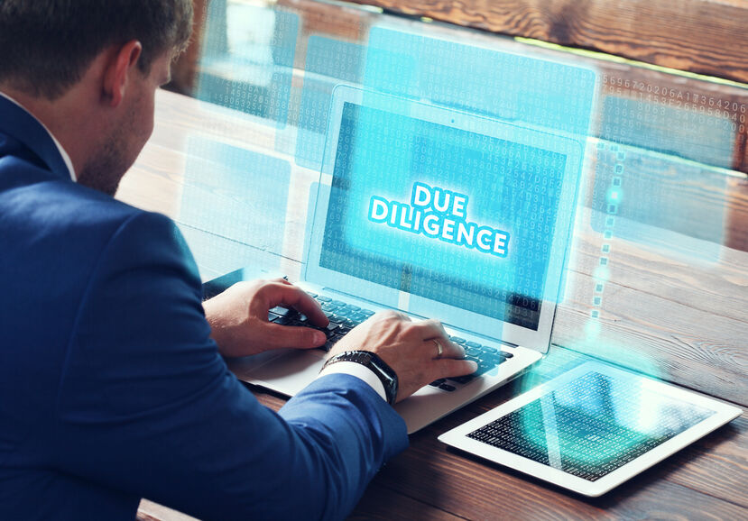Businessman on computer doing due diligence in Latin America